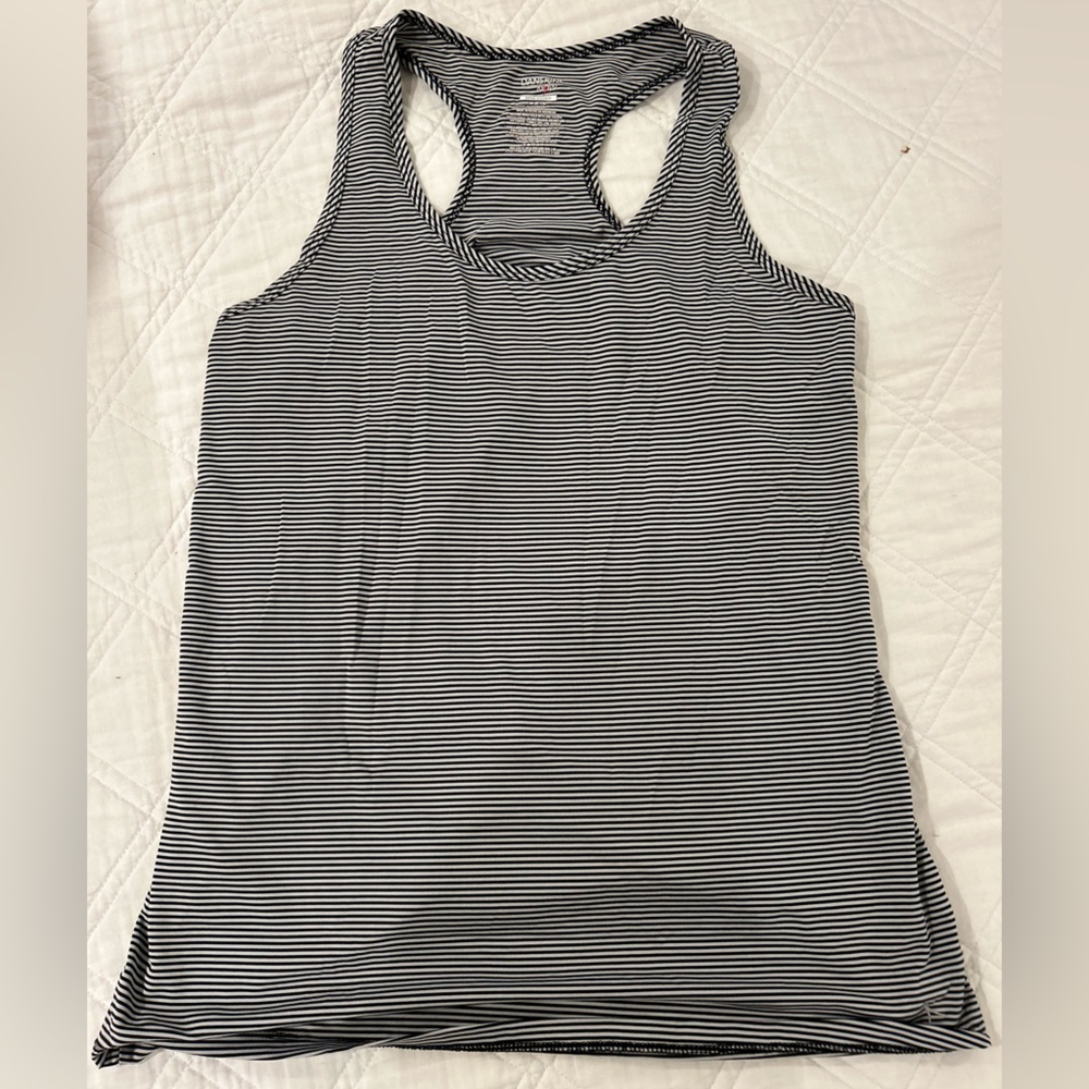 Walmart. Women’s medium, black/white stripped athletic tank top.